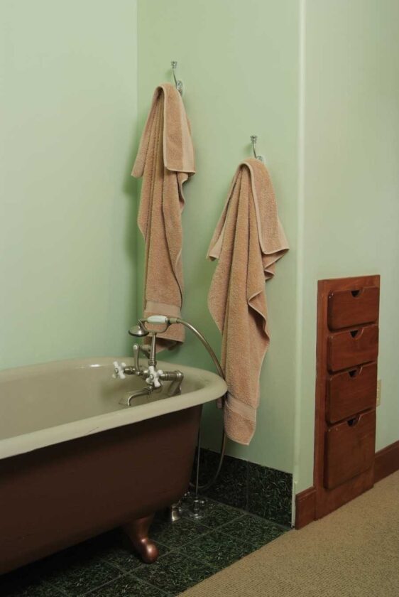 The architect's wife, Debe Grantham, refinished a salvaged antique bathtub for the master bathroom.